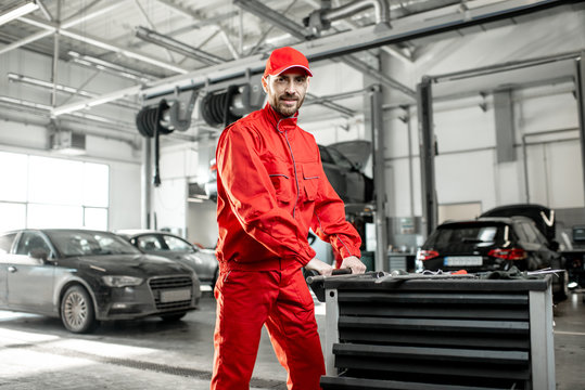 The individual is a tyre service technician, responsible for inspecting, replacing, repairing, and balancing tyres to ensure vehicle safety and performance.